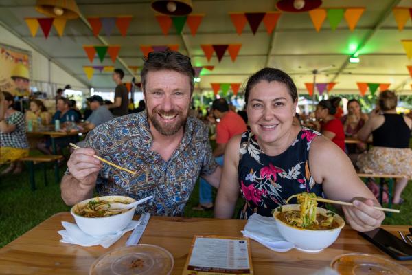 People enjoying laksa at the Darwin International Laksa Festival 2021